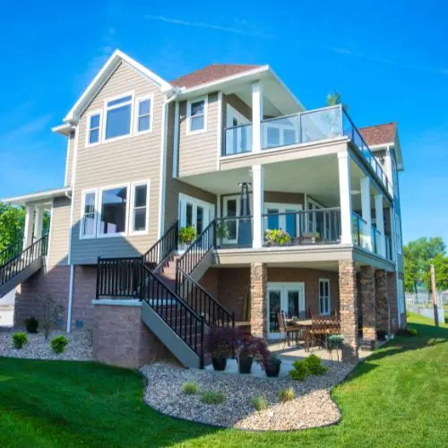 Exterior view of a modern two-story home with updated windows