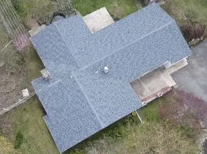 can you put new roof shingles over old ones
