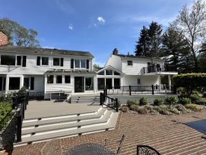 how to break up ice dam on roof