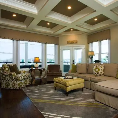 Elegant living room showcasing wide replacement windows and custom ceiling design – Home Makeover window replacement project