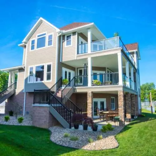 Exterior view of a modern two-story home with updated windows